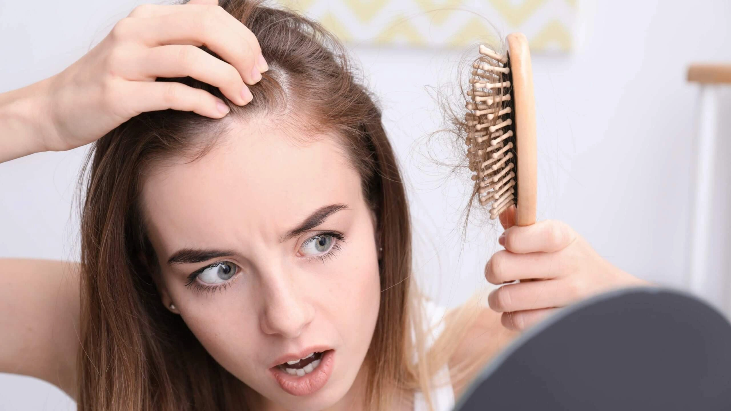 nguyên nhân rụng tóc ở nữ